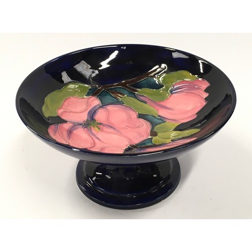 5 - Moorcroft magnolia pattern footed circular dish/tazza. 18cm diameter. Signed and stamped to base.