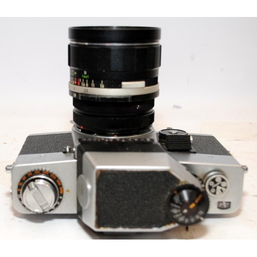 155 - Two vintage 35mm SLR cameras, an Exacta RTL with fitted Soligor 1:2.8 28mm lens, and an Olympus OM30... 