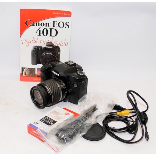 160 - Canon D40 digital Slr camera c/w 18-55mm zoom lens. Comes in box with some ancillary items and 300 p... 