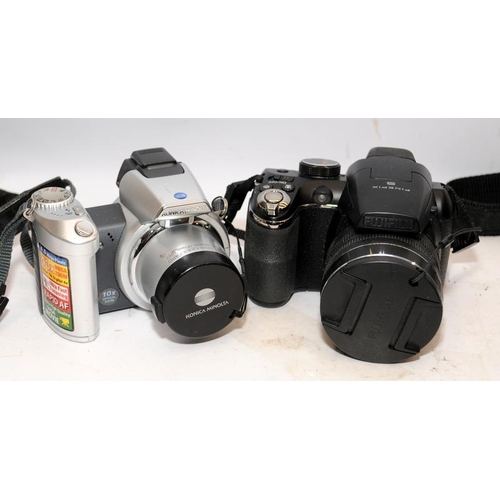 165 - Collection of compact and DSLR digital cameras including Nikon and Fuji. Six in lot, all offered unt... 