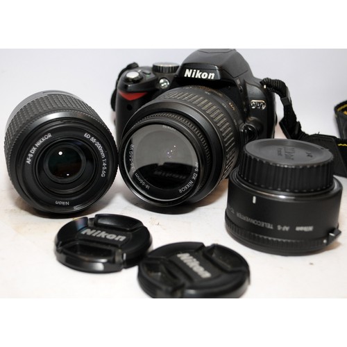 153 - Nikon D60 Dslr camera c/w 18-55mm, 55-200mm zoom lenses and Nikon branded 1.7x converter. Lot also i... 