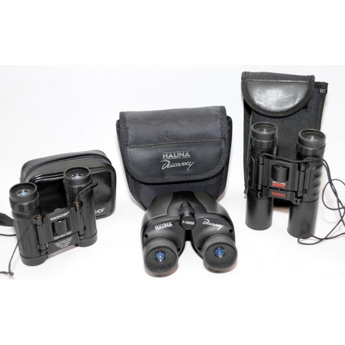 174 - Three pairs of cased compact binoculars by Tasco, Halina and Praktica