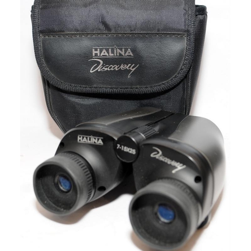 174 - Three pairs of cased compact binoculars by Tasco, Halina and Praktica