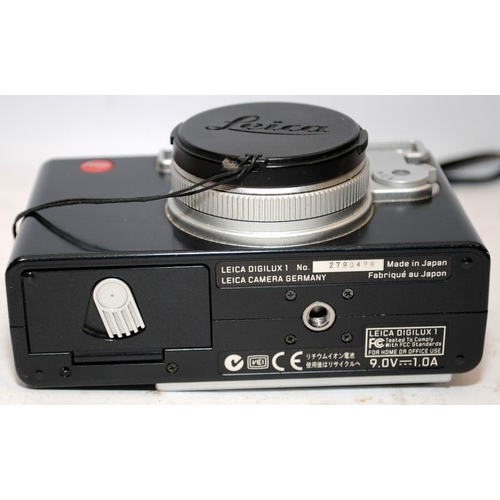 158 - Quality Leica Digilux 1 4mp digital camera c/w battery, charger cable, soft case and other ancillary... 