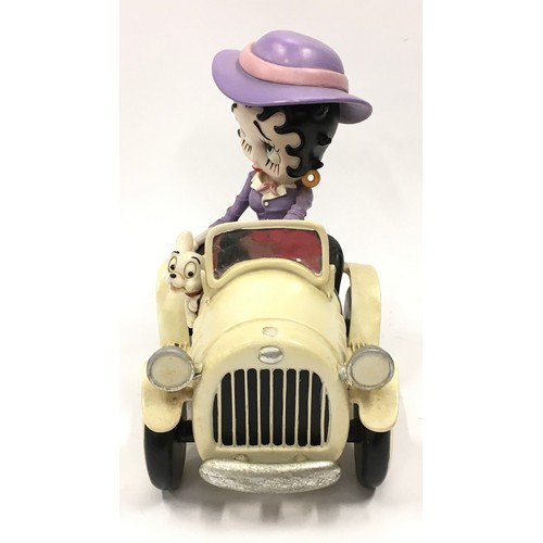 111 - Betty Boop figurine in car with dog by King Features Syndicate 2003. 23cm tall.