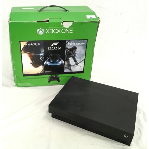 26 - An Xbox One console in box, no accessories.