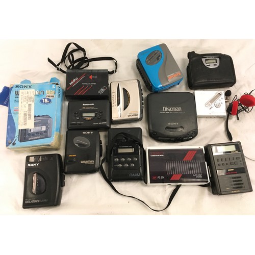 57 - Various Walkman and cassette players.