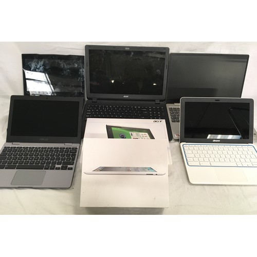 35 - Various Laptops, tablets and an Apple Ipad.