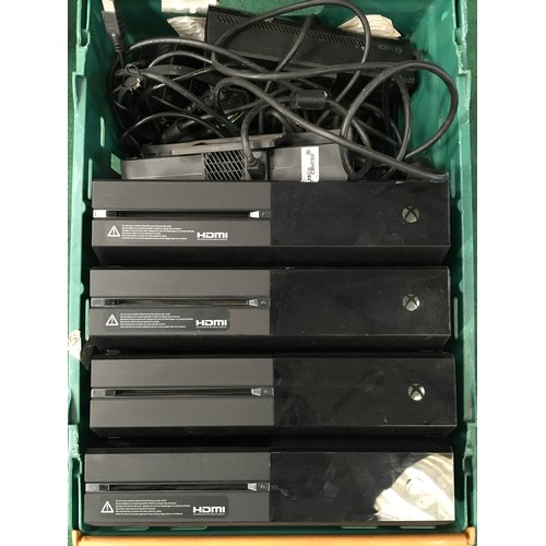 29 - A box containing four Xbox one consoles, Kinects and power supplies.