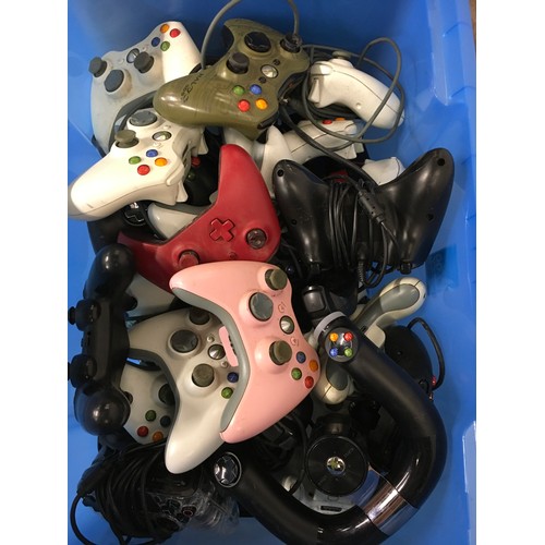 47 - A collection of 39 various Xbox and PlayStation hand held controllers with various power supplies an... 