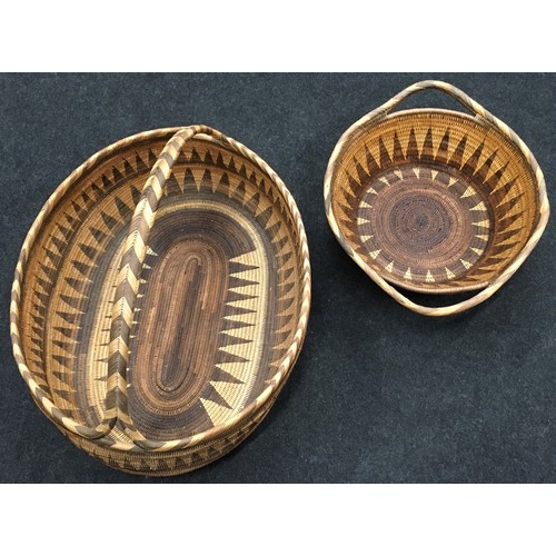 116 - Two quality hand woven baskets. Vendor advises these were acquired in Papua New Guinea. Largest meas... 