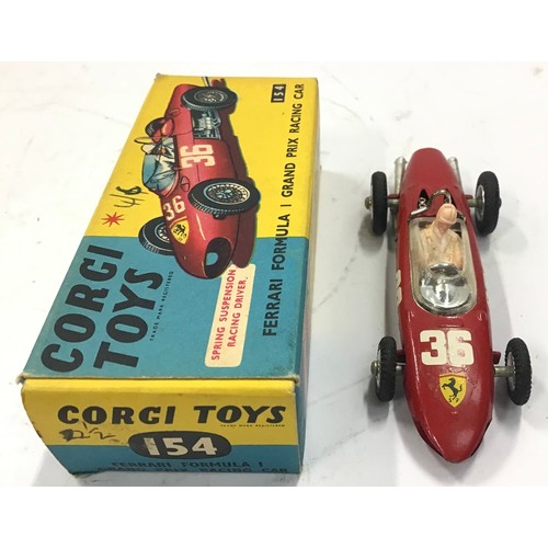 88 - Corgi 154 Ferrari Formula 1 Grand Prix Racing Car - red, spun hubs, figure driver, racing number 36;... 