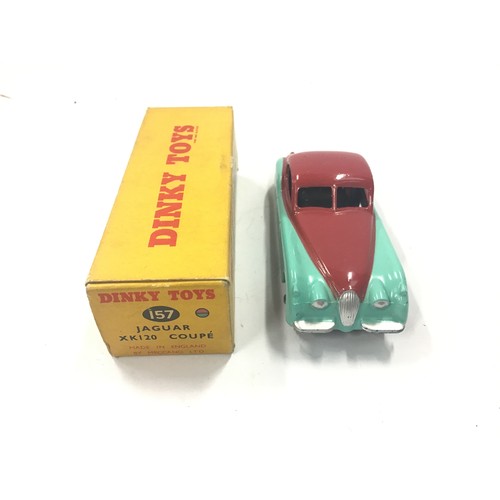 73 - Dinky 157 Jaguar XK120 Coupe - two-tone turquoise, cerise including ridged hubs with treaded tyres, ... 