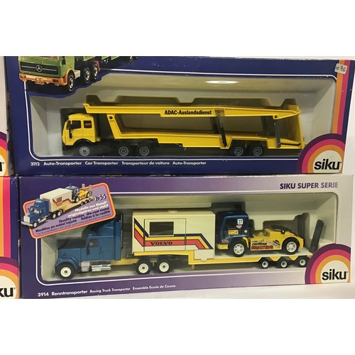 17 - Siku boxed group to include 3914 Racing Truck Transporter, 3911 Low Loader with Excavator and Wheel ... 