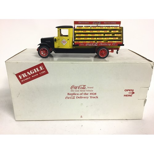 107 - Danbury Mint Replica of the 1928 Coca Cola Delivery Truck. Appears Near Mint, boxed.