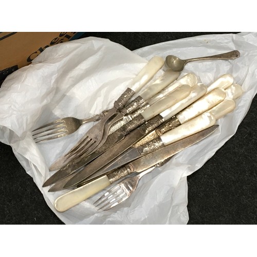 101 - Large collection of assorted silver plated flatware to include mother of pearl handled examples.