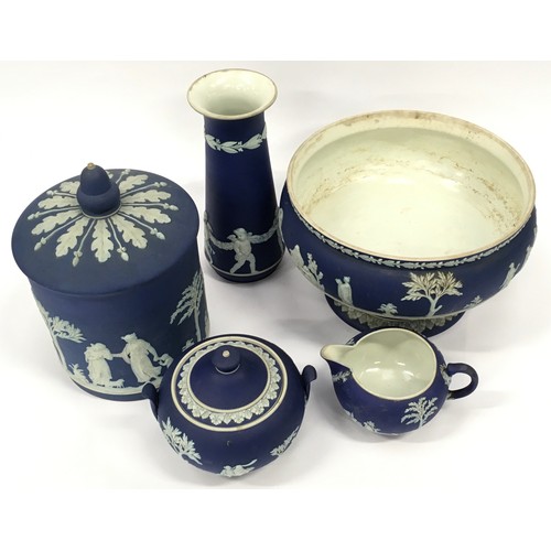 107 - Wedgwood Jasperware collection of dark blue pieces to include large footed bowl, biscuit barrel and ... 