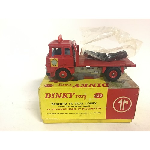 123 - Dinky 425 Bedford TK Coal Lorry - red cab, back and plastic hubs, blue interior, silver chassis and ... 