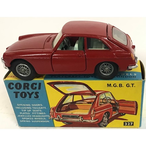 126 - Corgi 327 MGB GT Sports Car - red body, pale blue interior with black luggage case, chrome front and... 