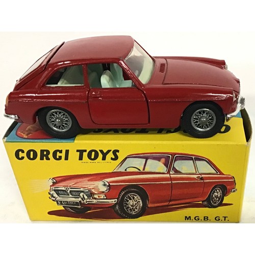 126 - Corgi 327 MGB GT Sports Car - red body, pale blue interior with black luggage case, chrome front and... 