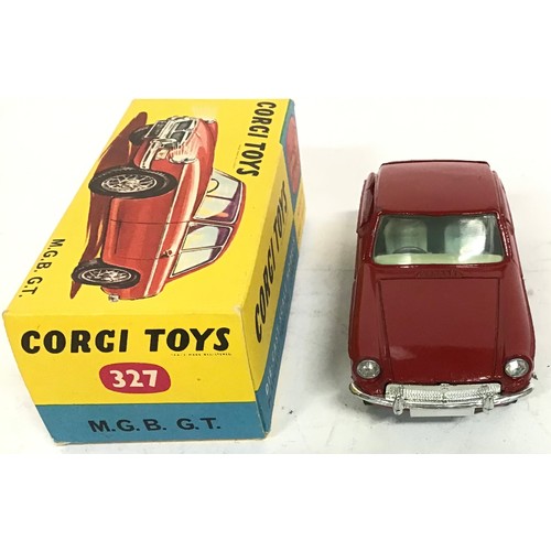 126 - Corgi 327 MGB GT Sports Car - red body, pale blue interior with black luggage case, chrome front and... 