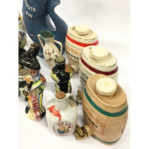 115 - Collection of ceramic Breweryana pieces to include Wade barrels and Drioli figural decanters.