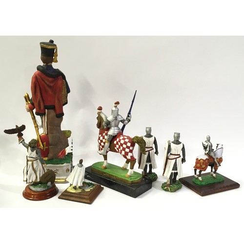 141 - Six knight figurines. Including Charlton Heston 