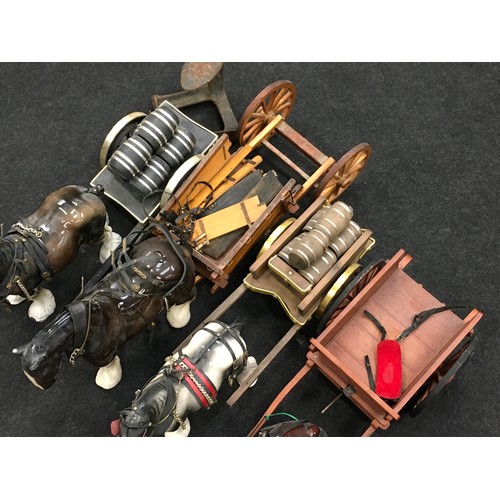 153 - Collection of four vintage ceramic shire horse figurines with carts together with a cast metal shoe ... 