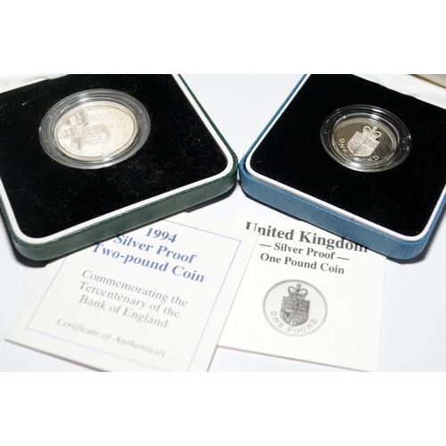 7 - A collection of silver coins to include proof Crowns, Two pounds and One Pound coins with certificat... 