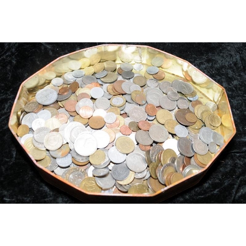 68 - Tin containing a collection of foreign coins (2)