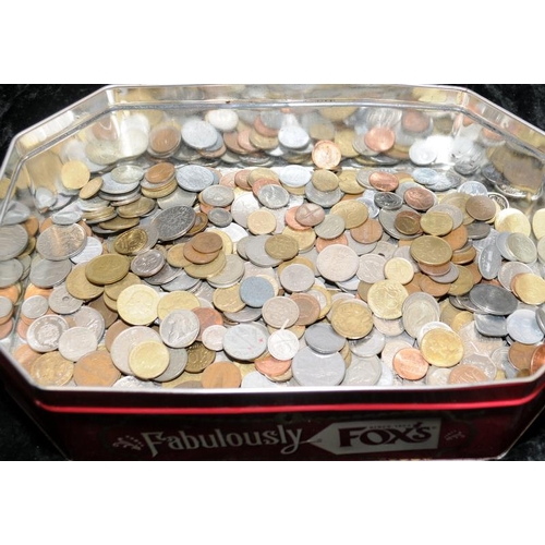 69 - Fox's tin of foreign coins (3)