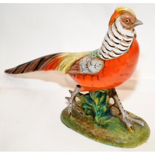 266 - A pair of quality early 20thC Italian pottery hand painted pheasants. Approx 28cms across