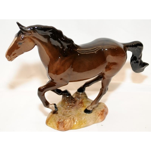 267 - Two Beswick horse figures including 'Spirit of Youth' mounted on wooden plinth.