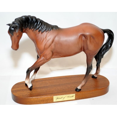 267 - Two Beswick horse figures including 'Spirit of Youth' mounted on wooden plinth.