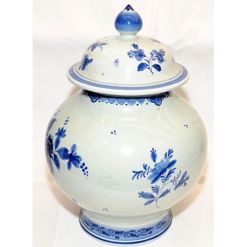 269 - A large Delft lidded jar. Approx 36cms tall