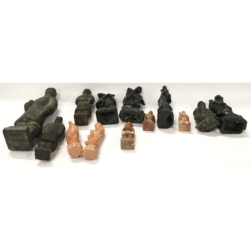 301 - A collection of oriental figurines to include terracotta warrior figures and carved stone examples (... 