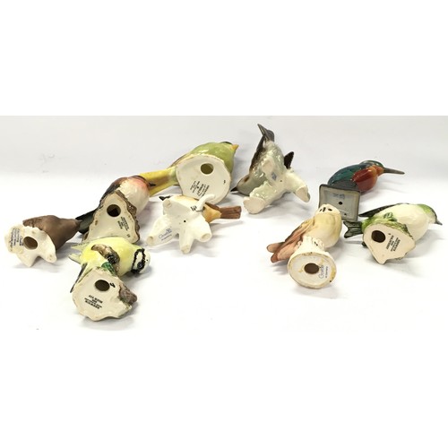 303 - A collection of Beswick and Geobel ceramic bird figurines (9).