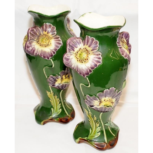 278 - pair of antique Art Nouveau majolica vases with applied flower decoration on dark green ground. 31cm... 