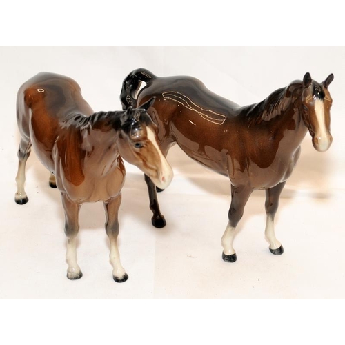 290 - Pair of opposite facing Beswick  glossy chestnut horses, 21cms tall