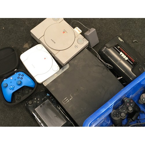 181 - A collection of gaming consoles and accessories to include Sega Matsersystem II, PS3 and others.