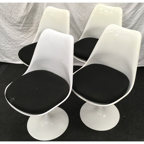 228 - Four vintage retro mid/late 20th century plastic swivel dining chairs with black padded upholstery s... 