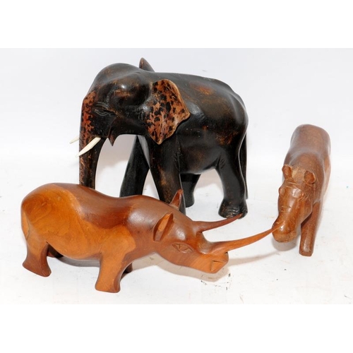 323 - Collection of wooden African animals, largest is 30cms tall. Five in lot (ts)