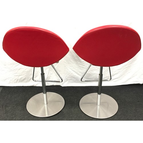 233 - A pair of red Cattelan Italia Kiss gas lift stools.