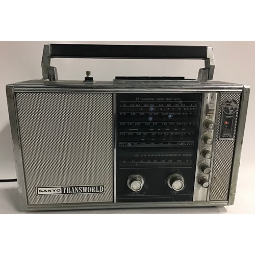 404 - SANYO VINTAGE PORTABLE RADIO. Model Transworld which powers up fine.