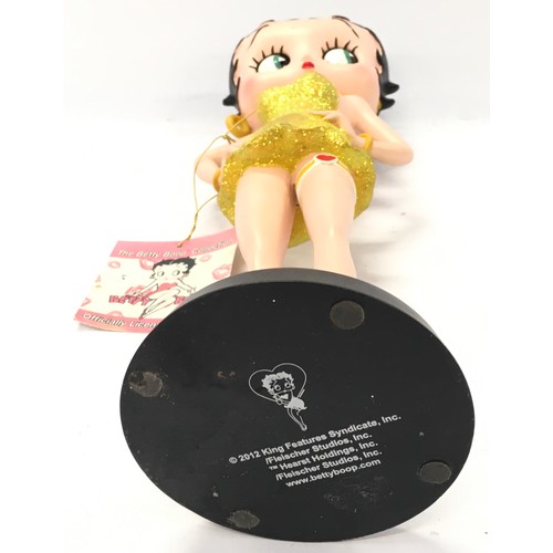 257 - Betty Boop small figurine in yellow sparkly dress 32cm tall.