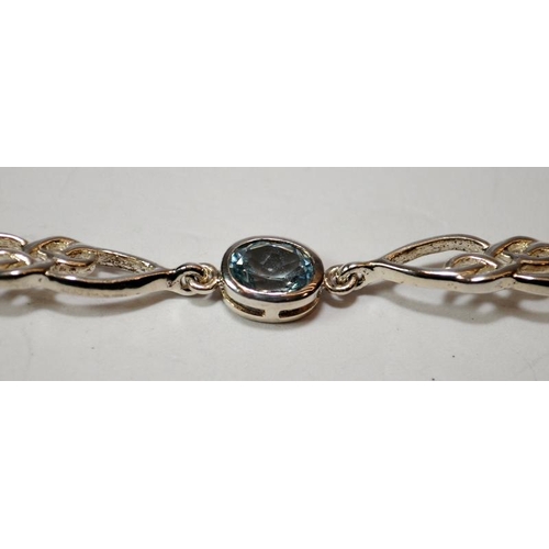 409 - Blue Topaz 925 silver Celtic knot bracelet.