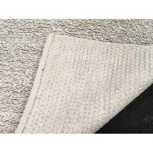 237 - A contemporary beige carpet. Vendor advises this is Laura Ashley although it is unmarked. 201x140cm.