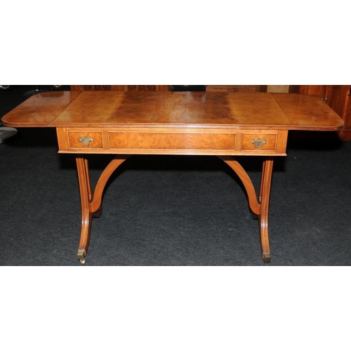 5 - Quality walnut veneer sofa/games table with extending drop sides. On outswept reeded legs with brass... 