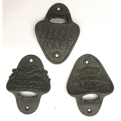 Seven branded cast metal bottle openers, Stella, Guinness etc.