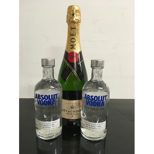 4 - 750ml bottle of Moët and Chandon together with two 350ml bottles of Absolut Vodka (1,2)